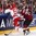 COLOGNE, GERMANY - MAY 6: Latvia's Miks Indrasis #70 and Denmark's Mathias Bau #50 battle for the puck during preliminary round action at the 2017 IIHF Ice Hockey World Championship. (Photo by Andre Ringuette/HHOF-IIHF Images)

